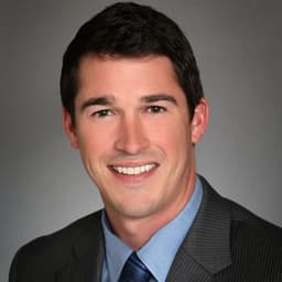 Alex Bouchard, Forward-Deployed AI Lead and founder of MidnightDev, Houston, Texas.